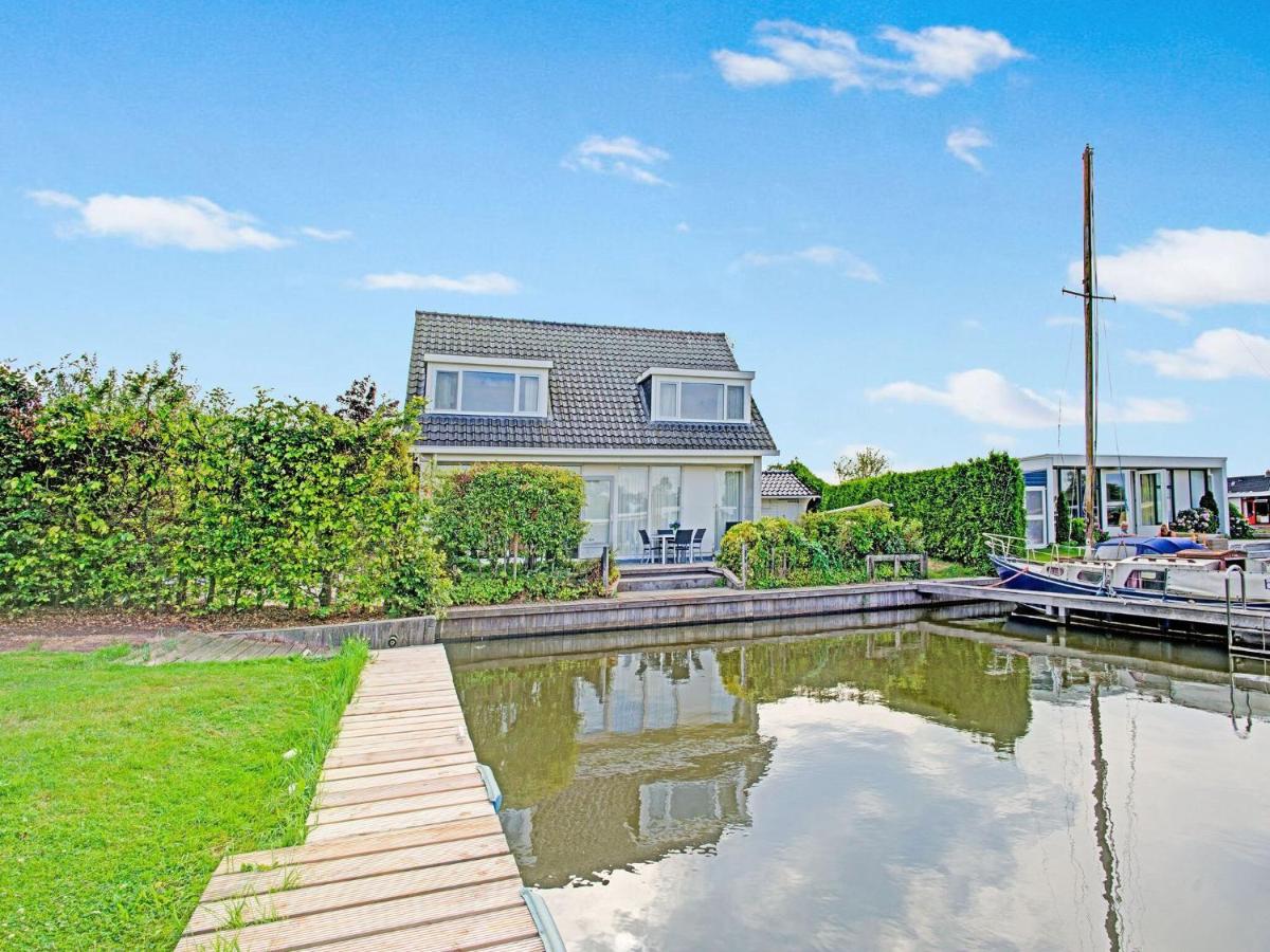 Detached house on the water with jetty in Langweer Frl Lemmer Main