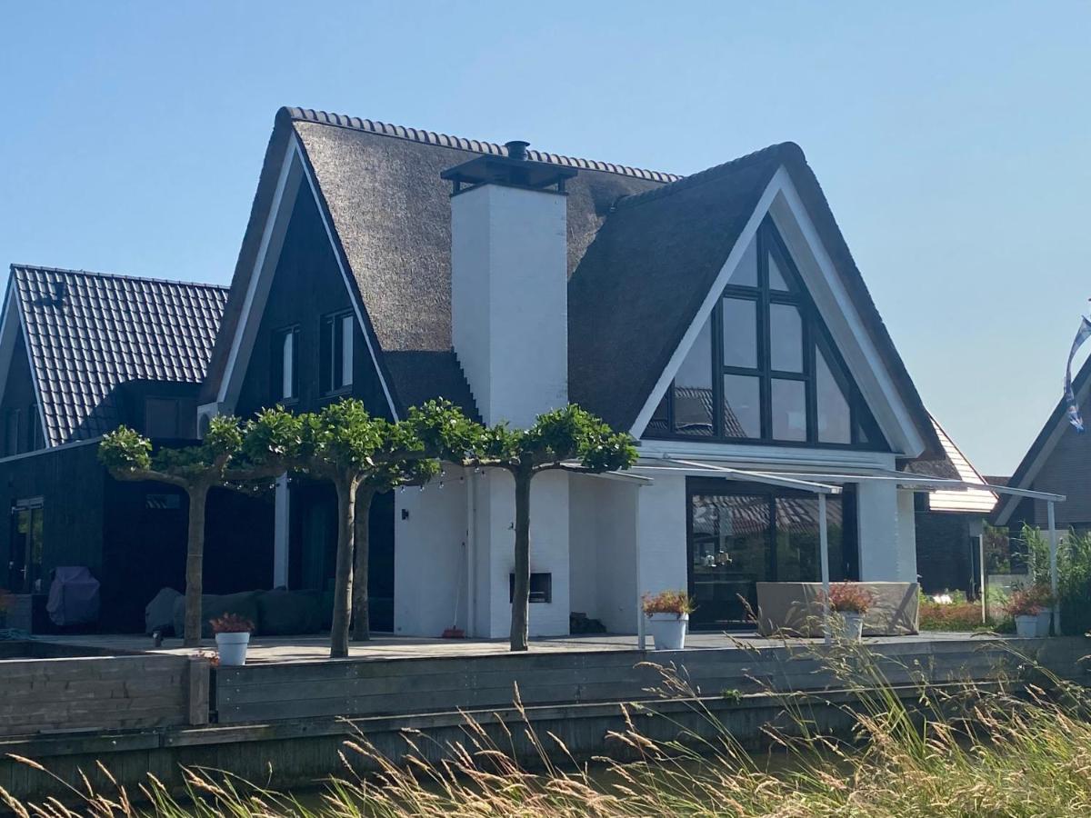 New high end waterfront family villa  friesland